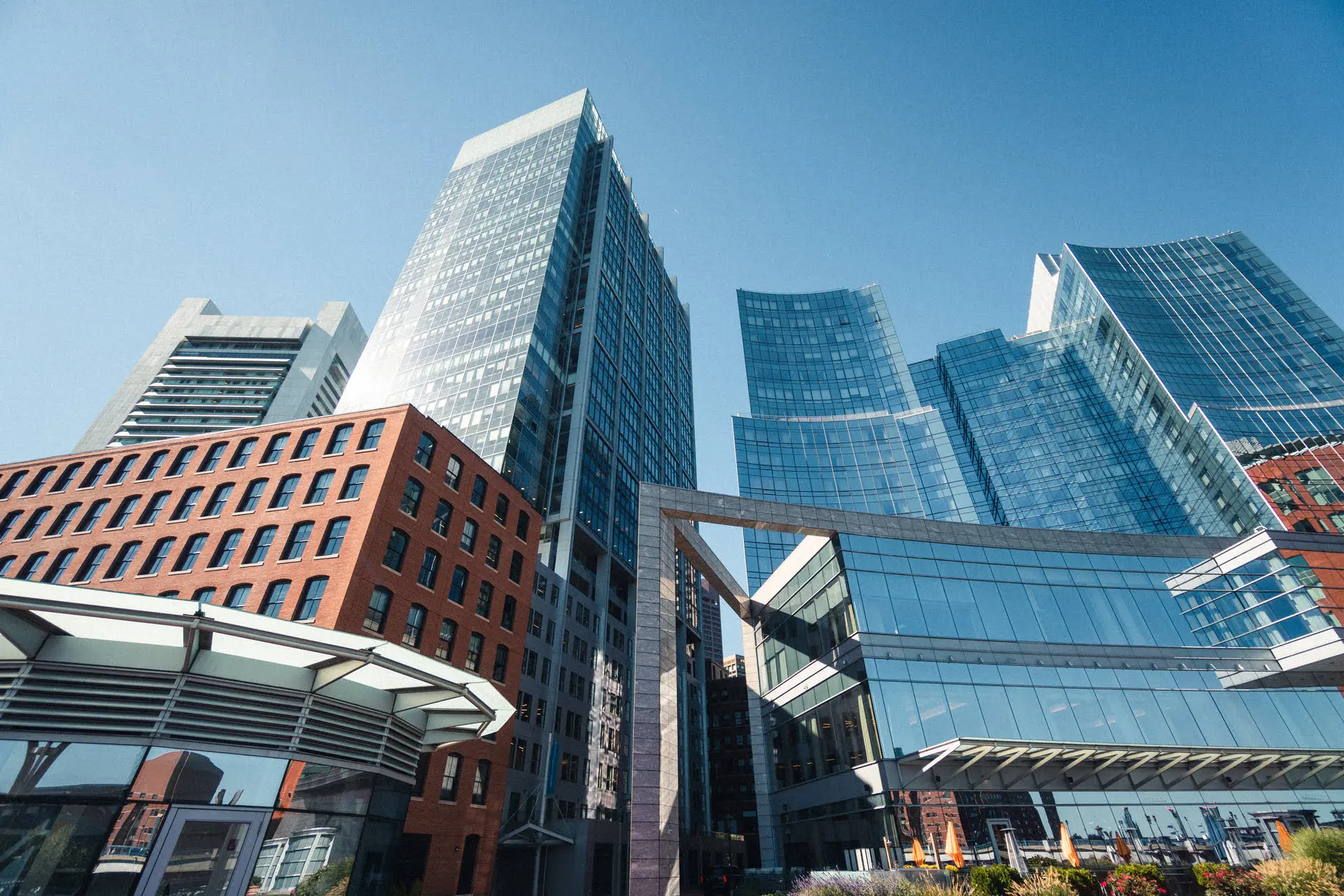 Skyscrapers and modern buildings under clear sky.